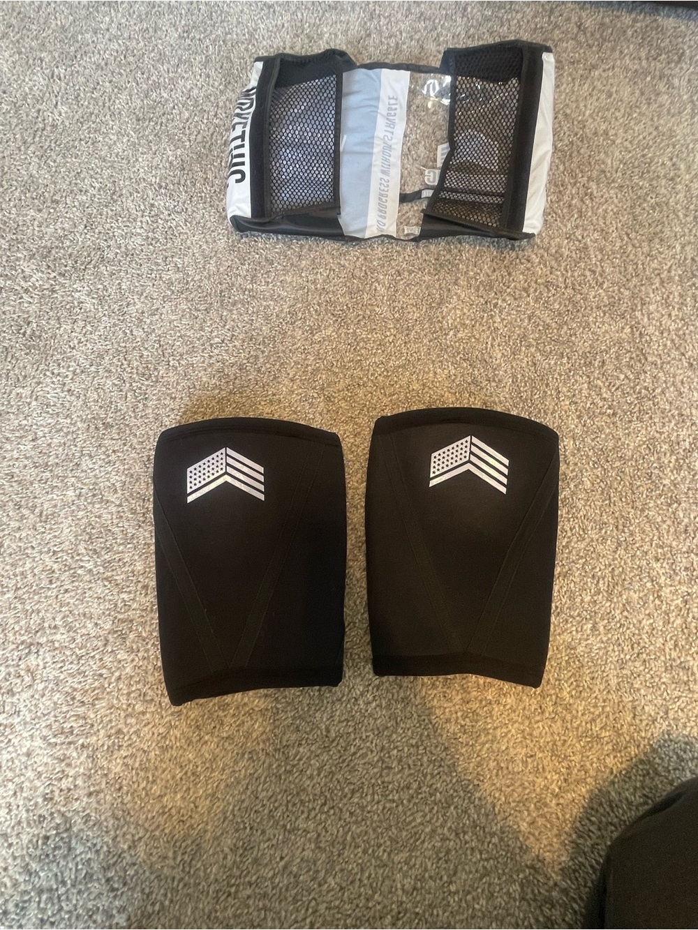 Black WrkEthic Compression Knee Sleeves with White Logo
